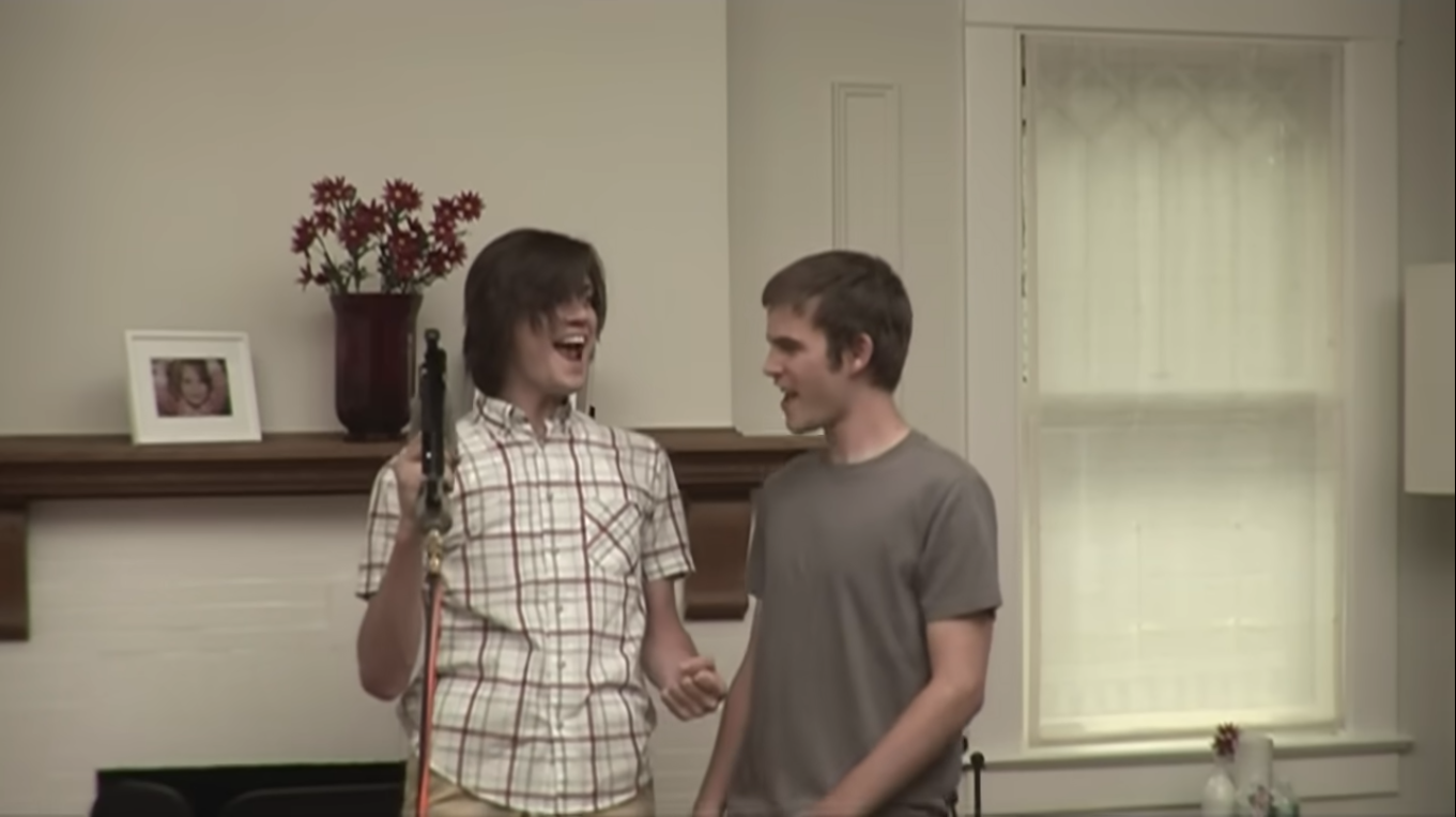 photos of two white guys one of them is holding a nail gun both are cheering "nail gun"